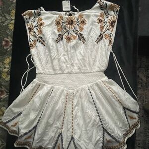 Embroidered White Dress with Floral Design